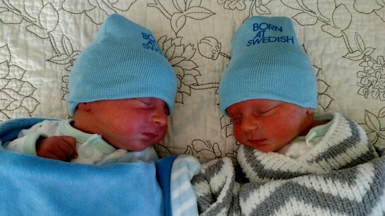 Two sets of hands, two sets of eyes. Twins are such a delightful surprise!
